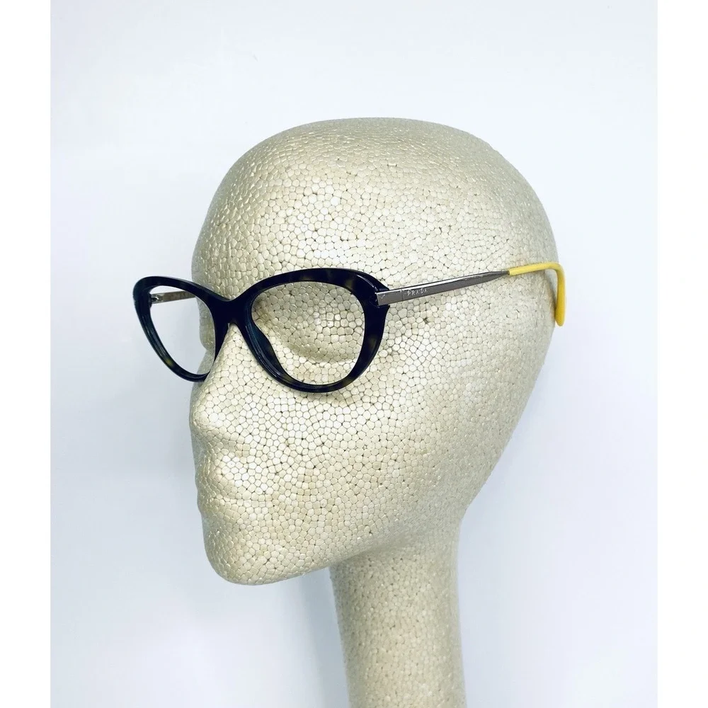Prada tortoise lucite